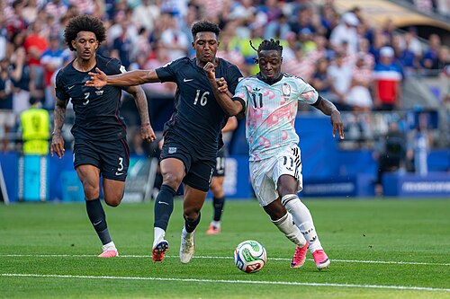 Alex Freeman Jeremy Doku during Belgium v United States at the 2026 FIFA World Cup