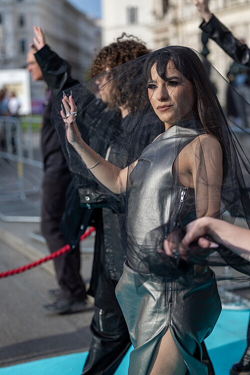 Alexandra Căpitănescu representing Romania on the Turquoise Carpet at the 2026 Eurovision Song Contest in Vienna