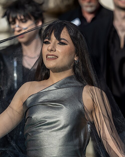 Alexandra Căpitănescu representing Romania on the Turquoise Carpet at the 2026 Eurovision Song Contest in Vienna