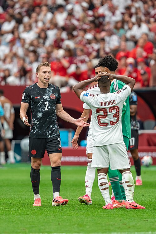Alistair Johnston Assim Madibo during Canada v Qatar on 18 June 2026 at the 2026 FIFA World Cup