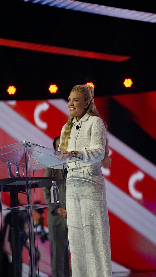 Erika Kirk presenting the Charlie Kirk Courage Award at AmericaFest 2025 (December 20, 2025)