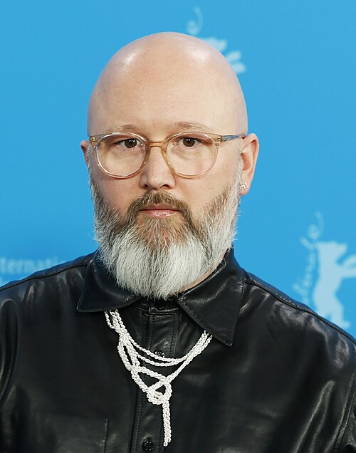 Angelo Tijssens pose at the "Dust" photocall  at Berlinale 2026 in Berlin, Germany