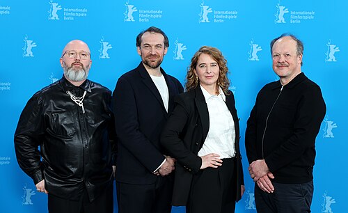Film Crew: Angelo Tijssens, Arieh Worthalter, Anke Blondé and Jan Hammenecker pose at the "Dust" photocall at Berlinale 2026 in Berlin, Germany