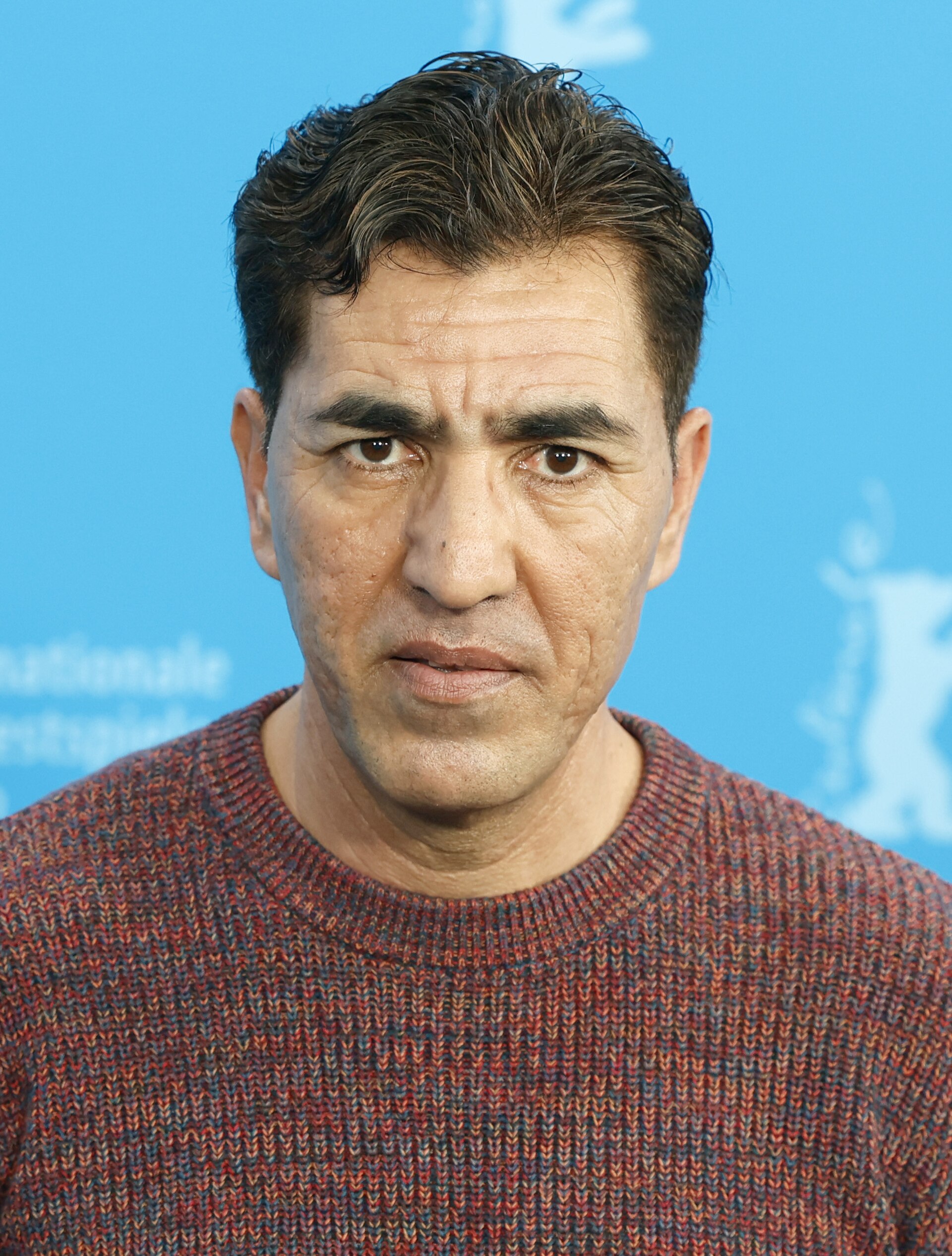 Anwar Hashimi poses at the "No Good Men" photocall  at Berlinale 2026 in Berlin, Germany