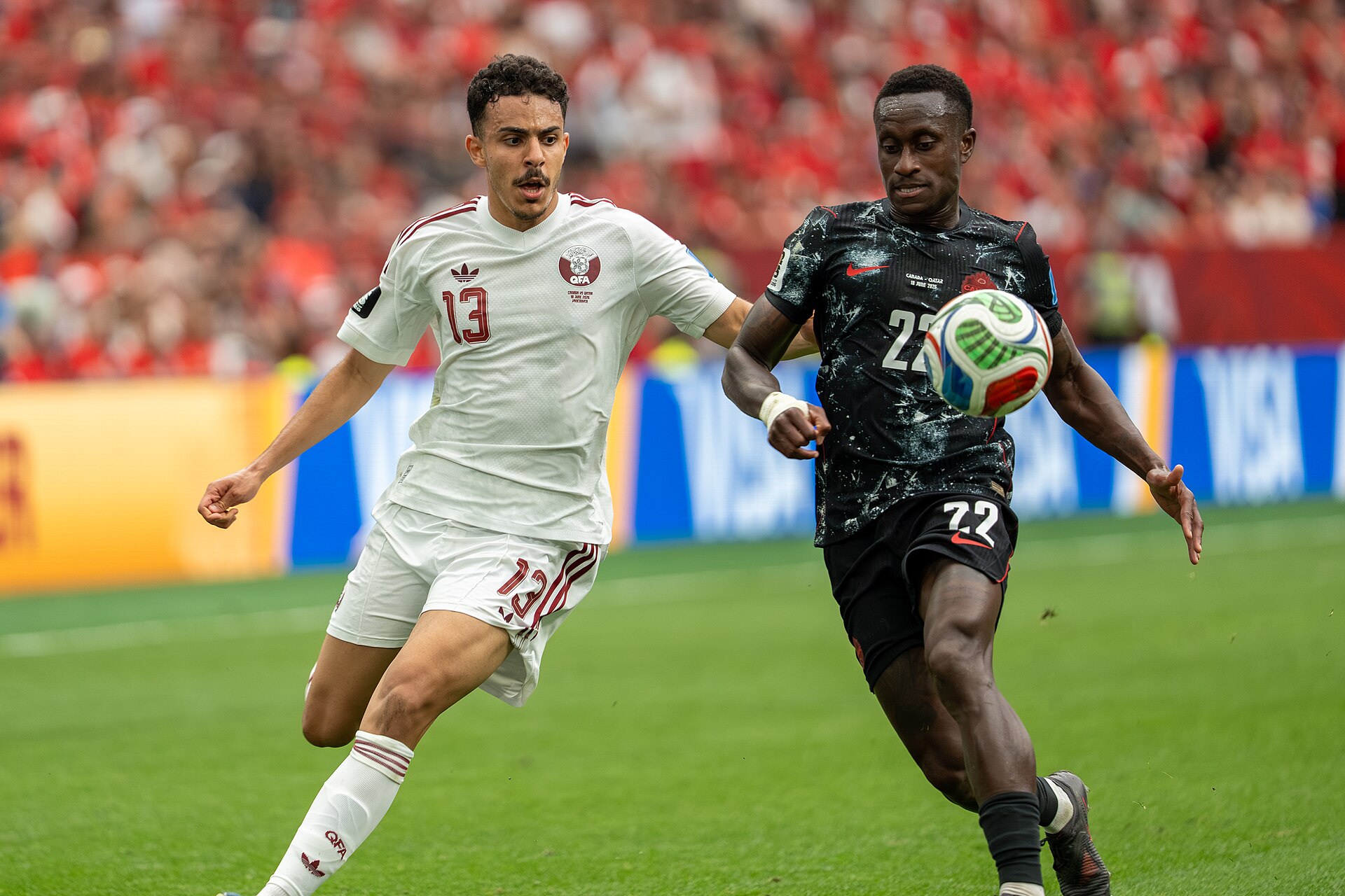 Ayoub Al-Oui Richie Laryea during Canada v Qatar on 18 June 2026 at the 2026 FIFA World Cup