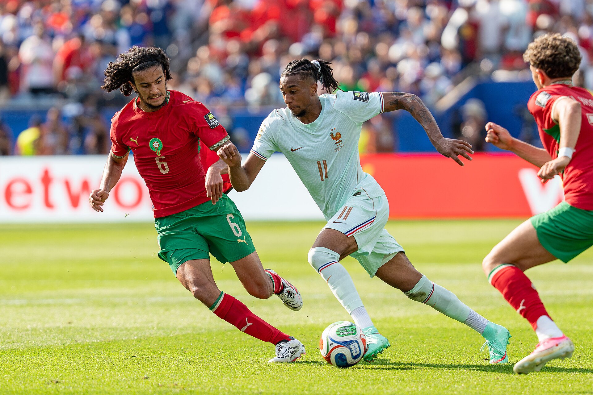 Ayyoub Bouaddi Michael Olise during France v Morocco at the 2026 FIFA World Cup