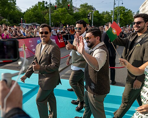 Bandidos do Cante representing Portugal on the Turquoise Carpet at the 2026 Eurovision Song Contest in Vienna