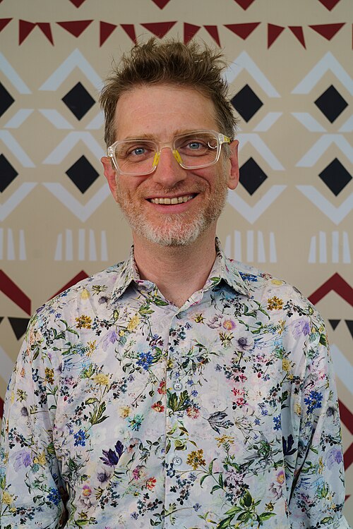 Benjamin Mako Hill portrait at Wikimania 2025 WikiPortraits Studio