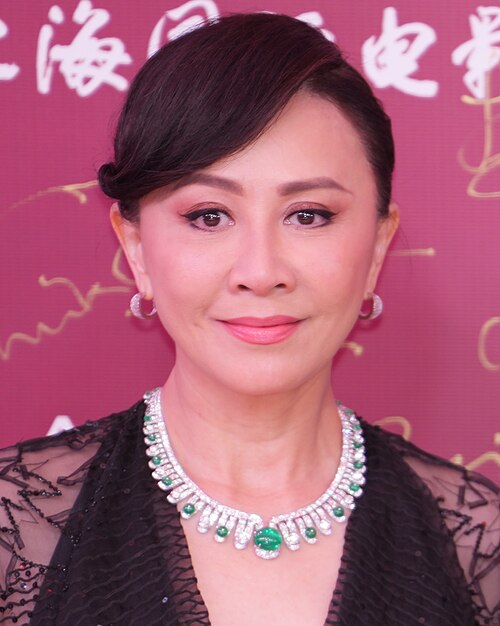 Tony Leung Chiu-wai and Carina Lau at 2026 Shanghai International Film Festival Closing Ceremony Red Carpet.