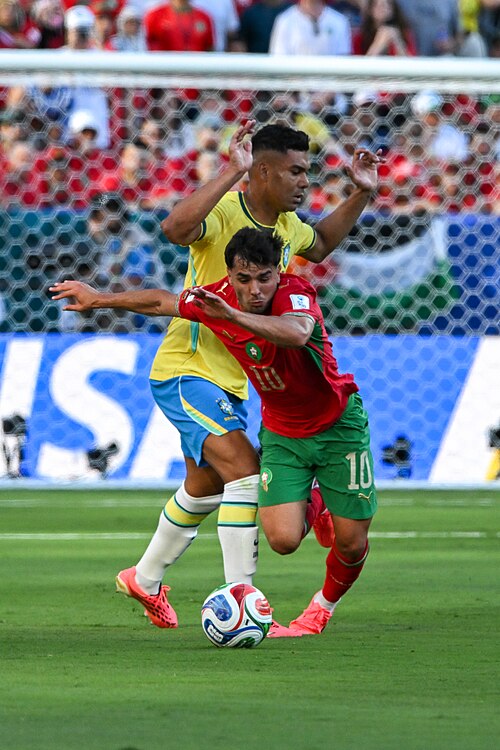 EAST RUTHERFORD, UNITED STATES - June 13: Casemiro of Brazil competes for the ball against Brahim Diaz of Morocco during the FIFA World Cup 2026 Group C match between Brazil and Morocco on June 13, 2026