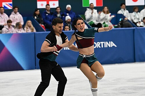 MILAN, ITALY - 06 FEBRUARY 2026: Charlene Guignard and Marco Fabbri of Italy compete during the  Ice Dance Rhythm Dance Team Event  at the Milano Ice Skating Arena at the Olympic Winter Games Milano Cortina 2026  on February 06, 2026 in ,