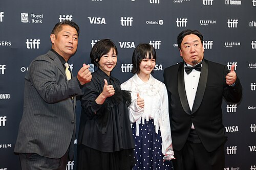 Children Untold at 2026 Toronto International Film Festival Group Pose with Thumbs Up and Hearts