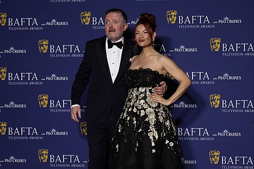 Chris McCausland & Dianne Buswell who presented a BAFTA TV Award, May 26