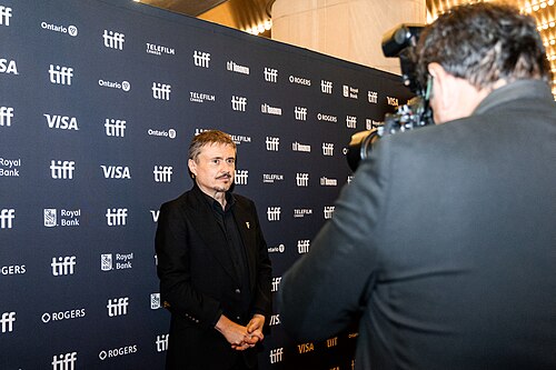 Cristian Mungiu being photographed at 2026 Toronto International Film Festival for Fjord Screening