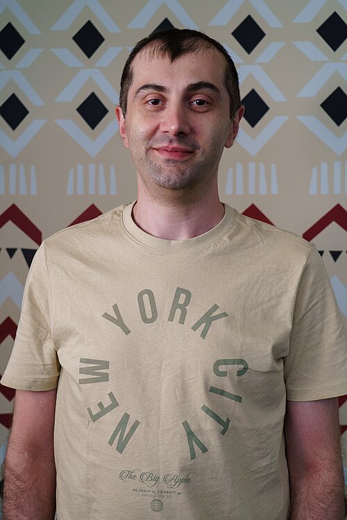 David Asriashvili portrait at Wikimania 2025 WikiPortraits Studio