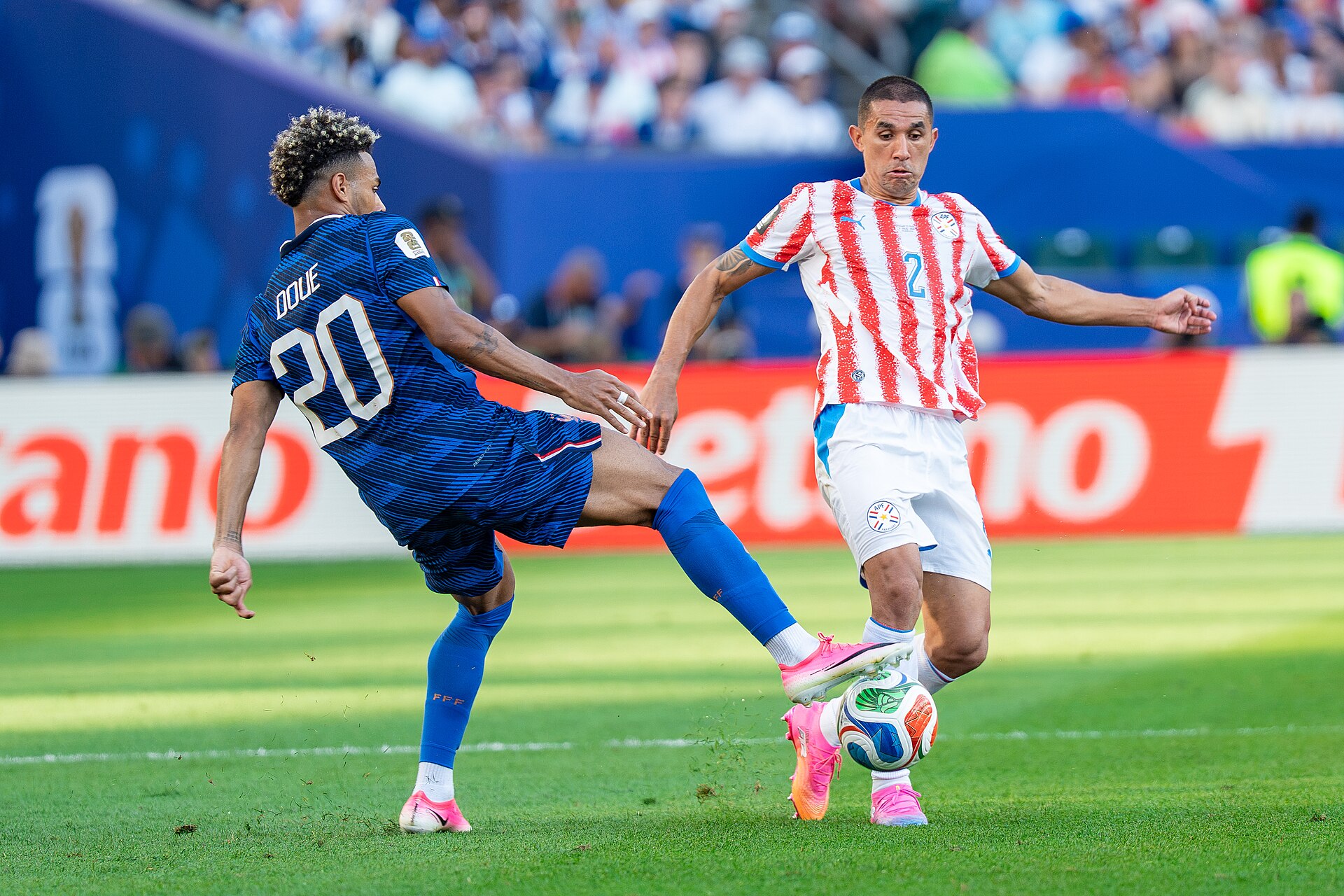 Desire Doue Gustavo Velazquez during France v Paraguay at the 2026 FIFA World Cup