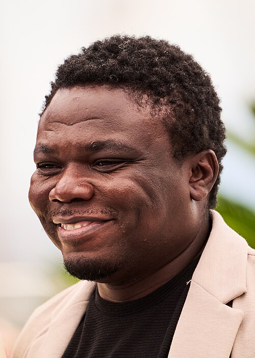 Dieudo Hamadi during a photocall at the 2025 Cannes Film Festival. They are part of the jury for the 2025 festival.