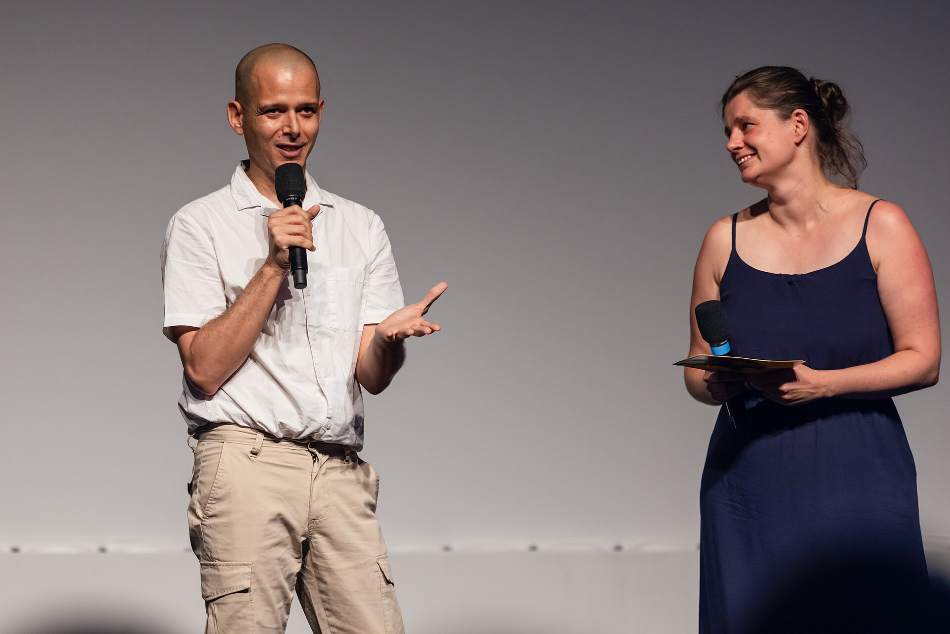Director Abdellah Taïa speaking on stage before the screening of 'Cairo Streets' at the 2025 Locarno Film Festival, Switzerland