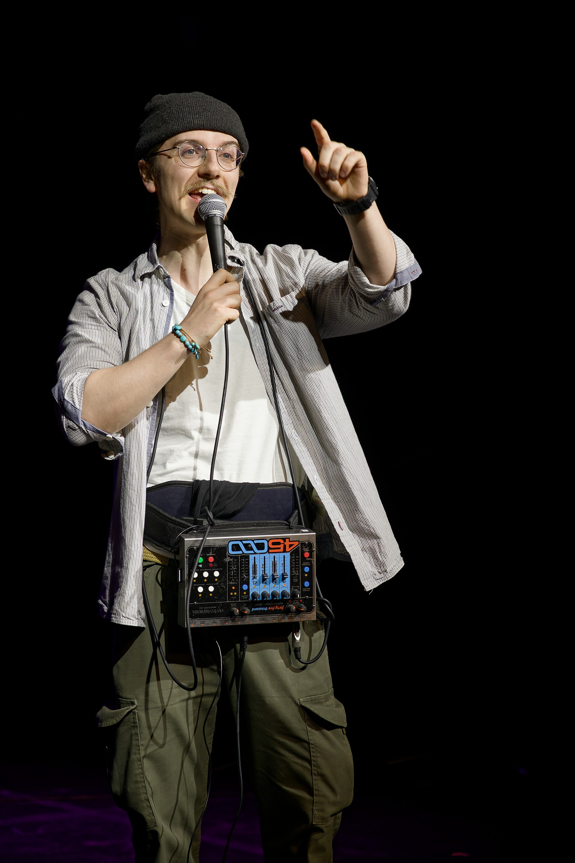 Dru Cripps, performer, at the 2024 Edinburgh Festival Fringe in the show, Fast Fringe.