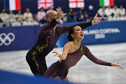 MILAN, ITALY - 06 FEBRUARY 2026: Ellie Kam and Danny O'Shea of United States compete during the Figure Skating Team Event Pair Skating Short Program at the Olympic Winter Games Milano Cortina 2026  Milano Ice Skating Arena on February 06, 2026 in Milan, Italy