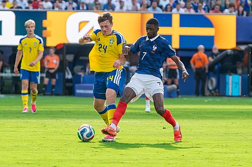Elliot Stroud Ousmane Dembele during France v Sweden at the 2026 FIFA World Cup