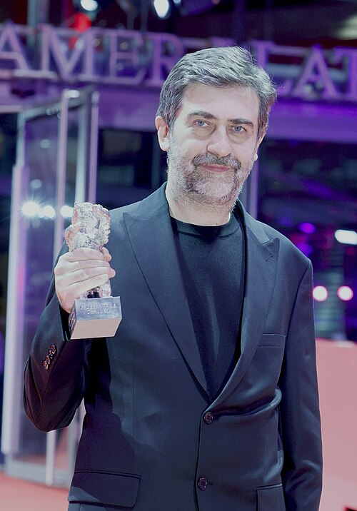 Emin Alper accepts the Silver Bear Grand Jury Prize for “Kurtuluş (Salvation)” on stage at the Award Ceremony  at Berlinale 2026 in Berlin, Germany