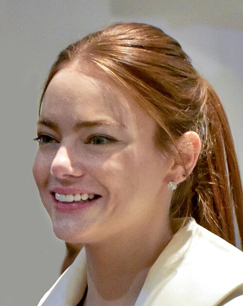 Emma Stone with fans after Kinds of Kindness press conference at 2024 Cannes Film Festival
