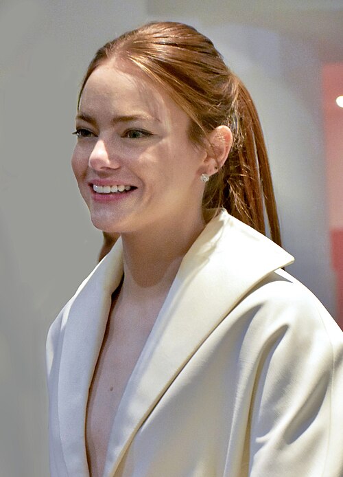 Emma Stone with fans after Kinds of Kindness press conference at 2024 Cannes Film Festival