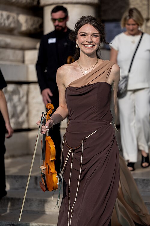 Eva Marija representing Luxembourg on the Turquoise Carpet at the 2026 Eurovision Song Contest in Vienna