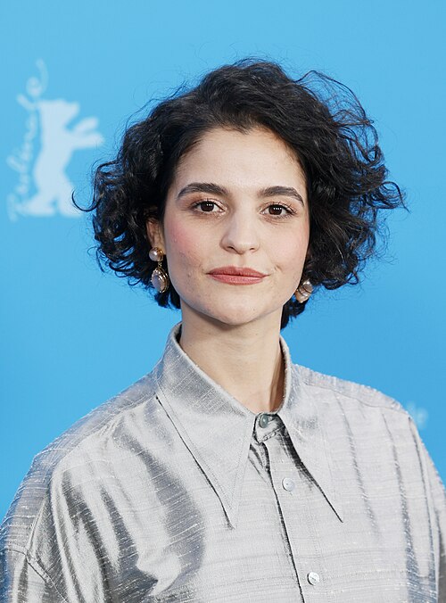 Eya Bouteraa pose at the "À Voix Basse" (In A Whisper) photocall at Berlinale 2026 in Berlin, Germany