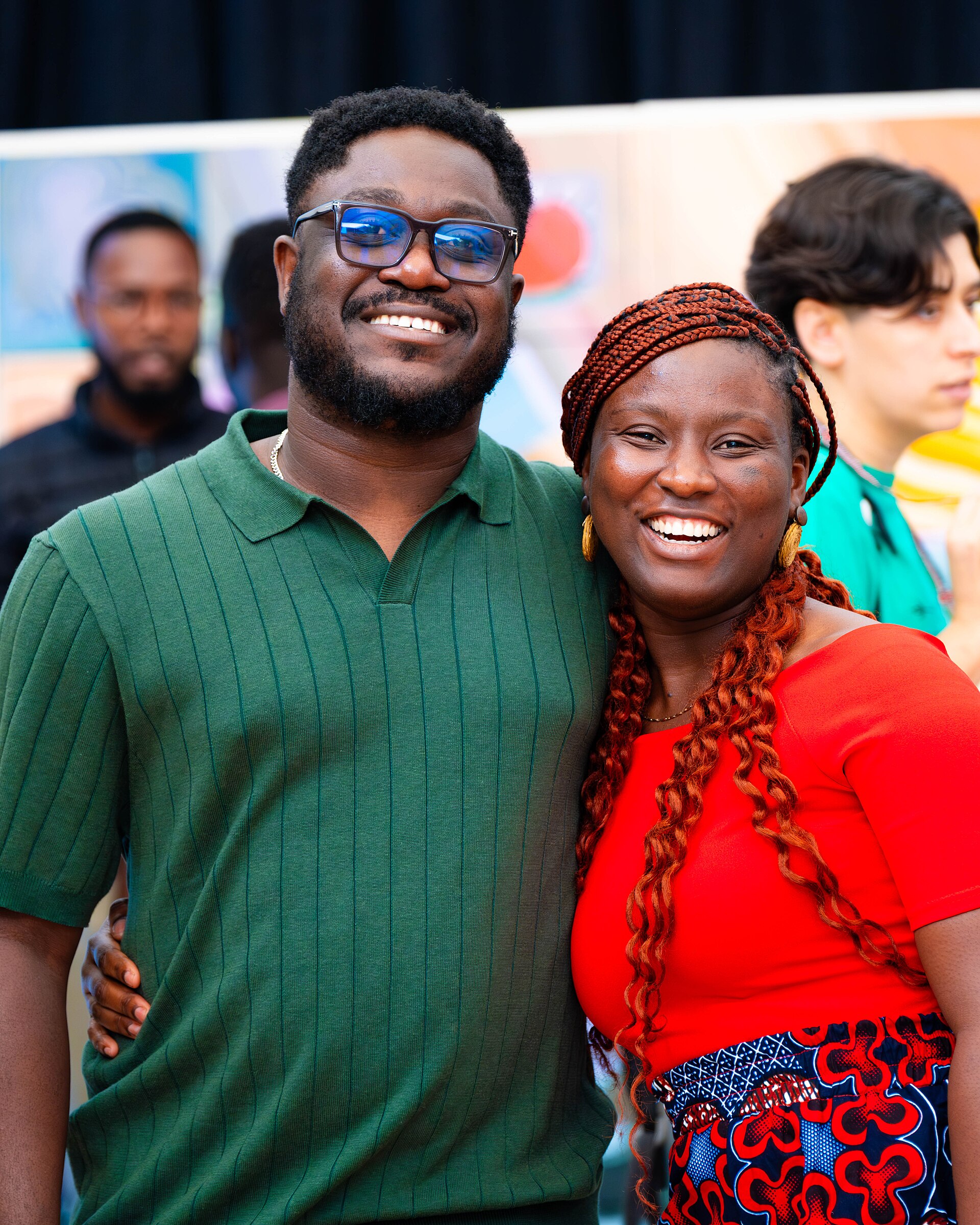 A Photo of Felix Nartey and Jael Boateng at Wikimania 2025 during the poster session
