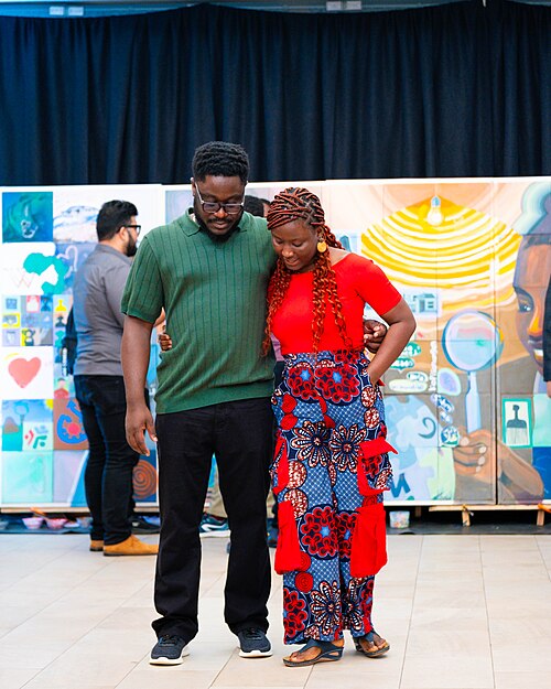 A Photo of Felix Nartey and Jael Boateng at Wikimania 2025 during the poster session