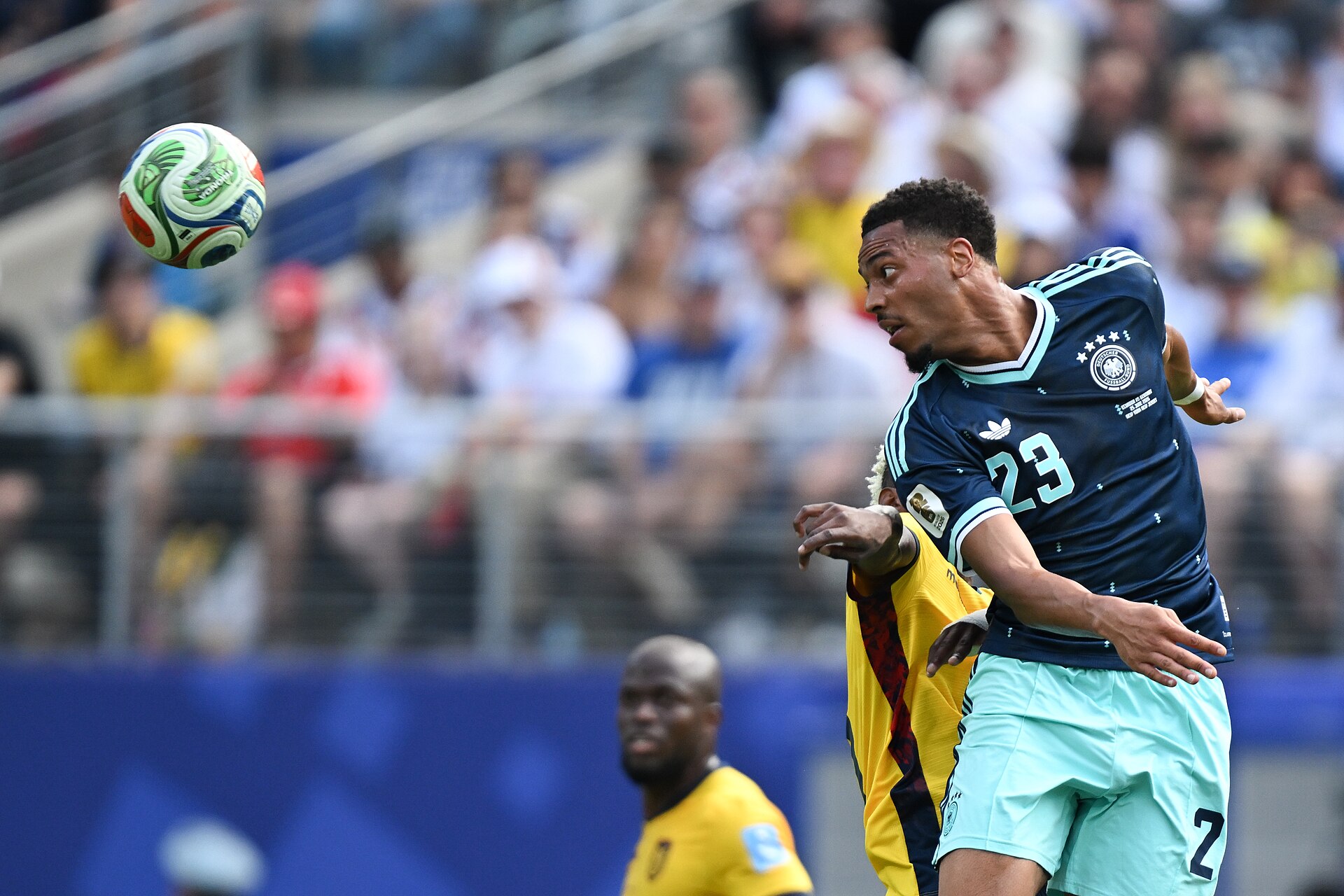 EAST RUTHERFORD, UNITED STATES - June 25: Felix Nmecha #23 of Germany battles in the air during the FIFA World Cup 2026 Group E match between Ecuador  and  Germany on June 25, 2026 MetLife Stadium, East Rutherford, New Jersey