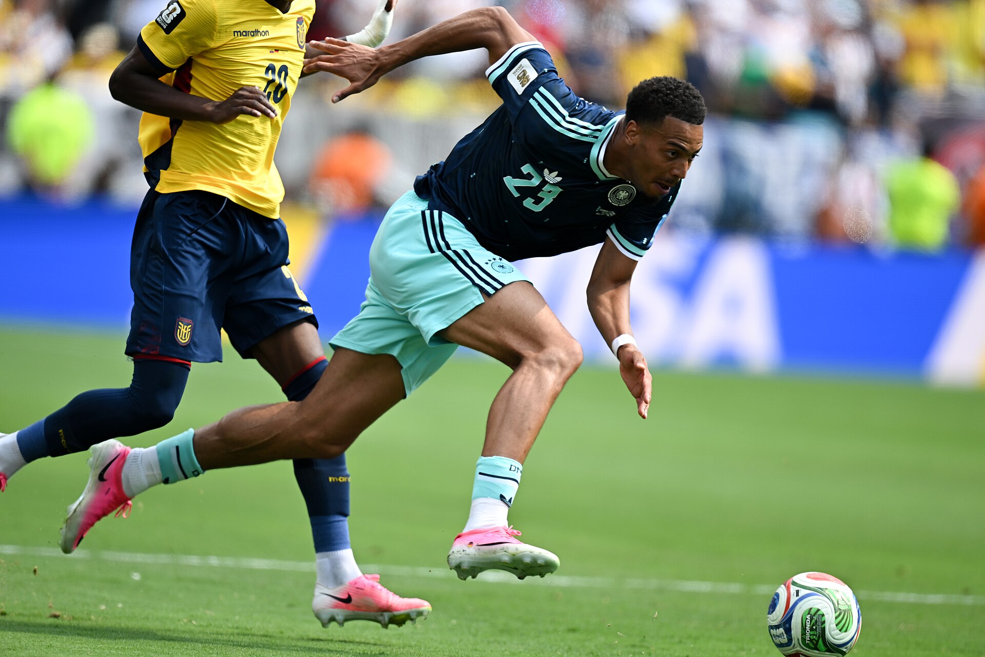 EAST RUTHERFORD, UNITED STATES - June 25: Felix Nmecha #23 of Germany battles for possession with Nilson Angulo #20 of Ecuador during the FIFA World Cup 2026 Group E match between Ecuador  and  Germany on June 25, 2026 MetLife Stadium, East Rutherford, New Jersey