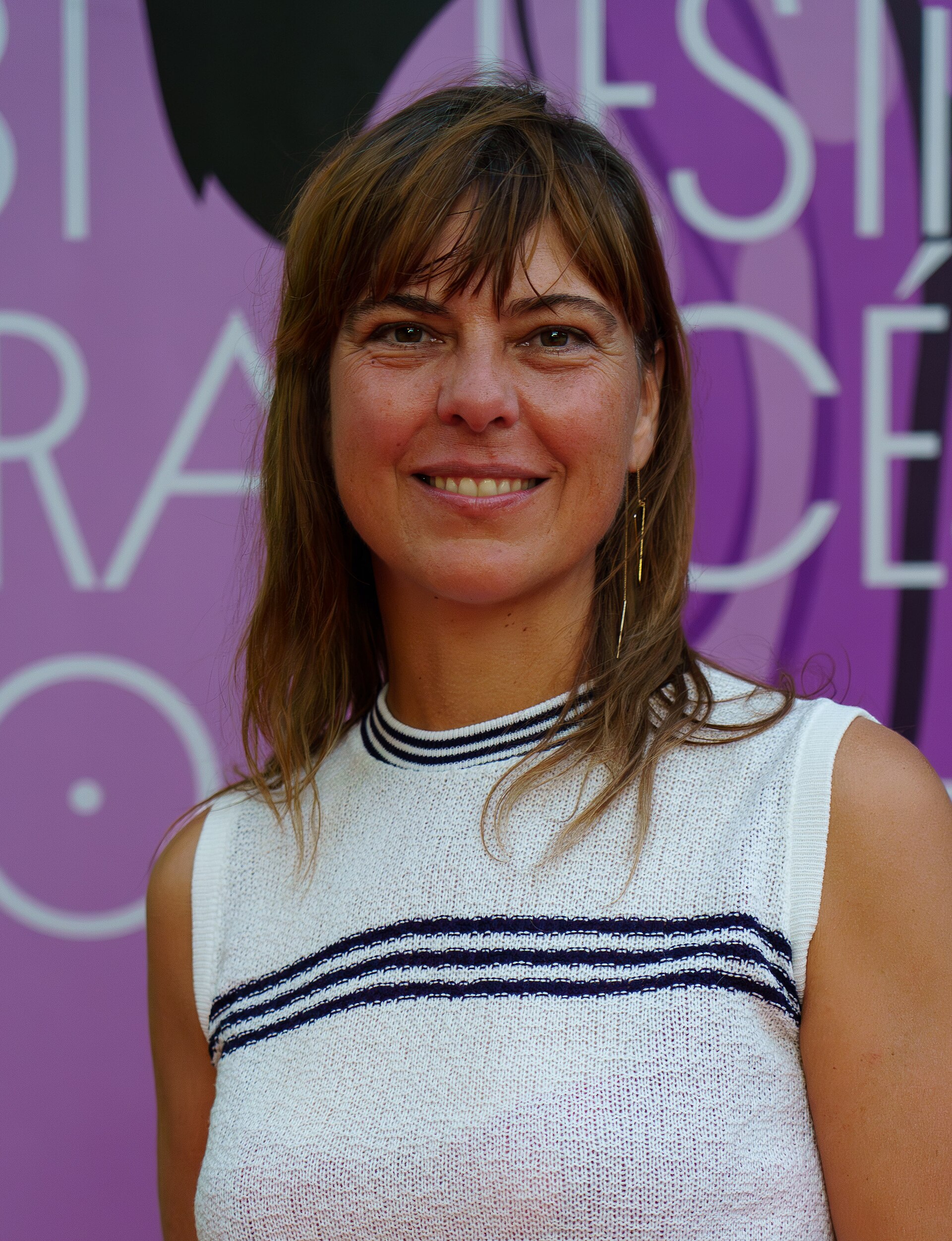 Sophie Deraspe on the red carpet at the 2025 Malaga French Film Festival next to the Albéniz Cinema