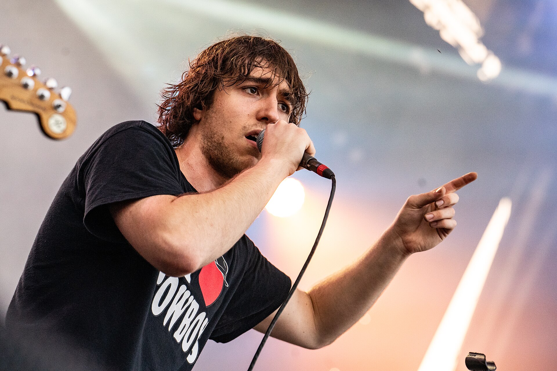 Cameron Winter, frontman of the band Geese performing at The Stage at Suffolk Downs in Boston as the openers for King Gizzard & The Lizard Wizard.