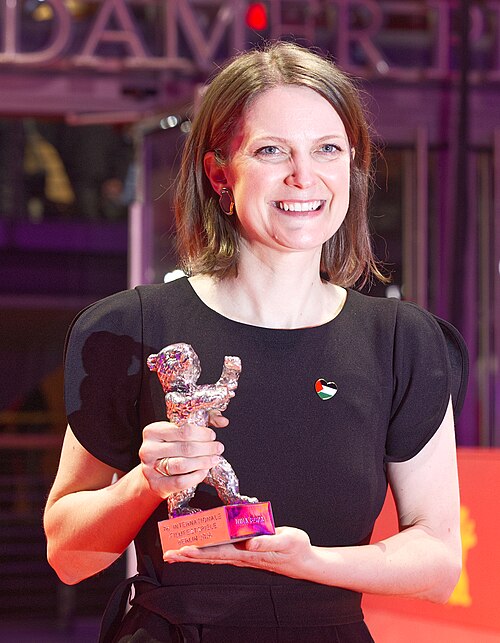 Geneviève Dulude-de Celles poses with the Silver Bear for Best Screenplay for “Nina Roza“ on the red carpet after the Award Ceremony of Berlinale 2026 in Berlin, Germany