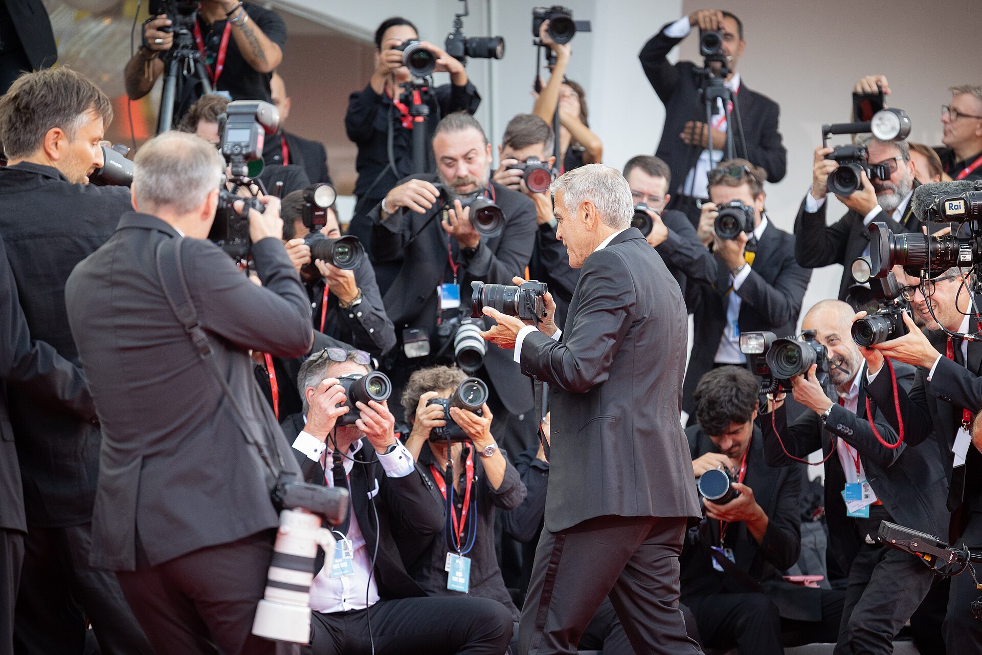 George clooney and photographers on the red carpet in Venice Film Festival -34
