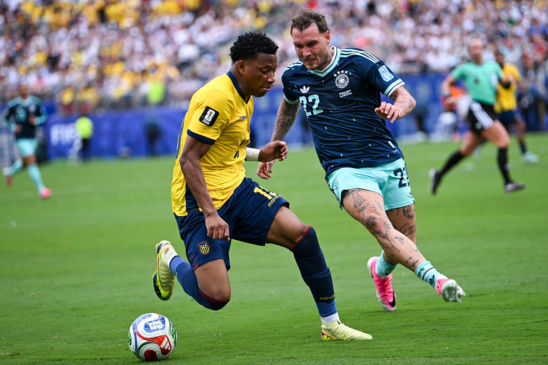 EAST RUTHERFORD, UNITED STATES - June 25: Gonzalo Plata #19 of Ecuador battles for possession with David Raum #22 of Germany during the FIFA World Cup 2026 Group E match between Ecuador  and  Germany on June 25, 2026 MetLife Stadium, East Rutherford, New Jersey