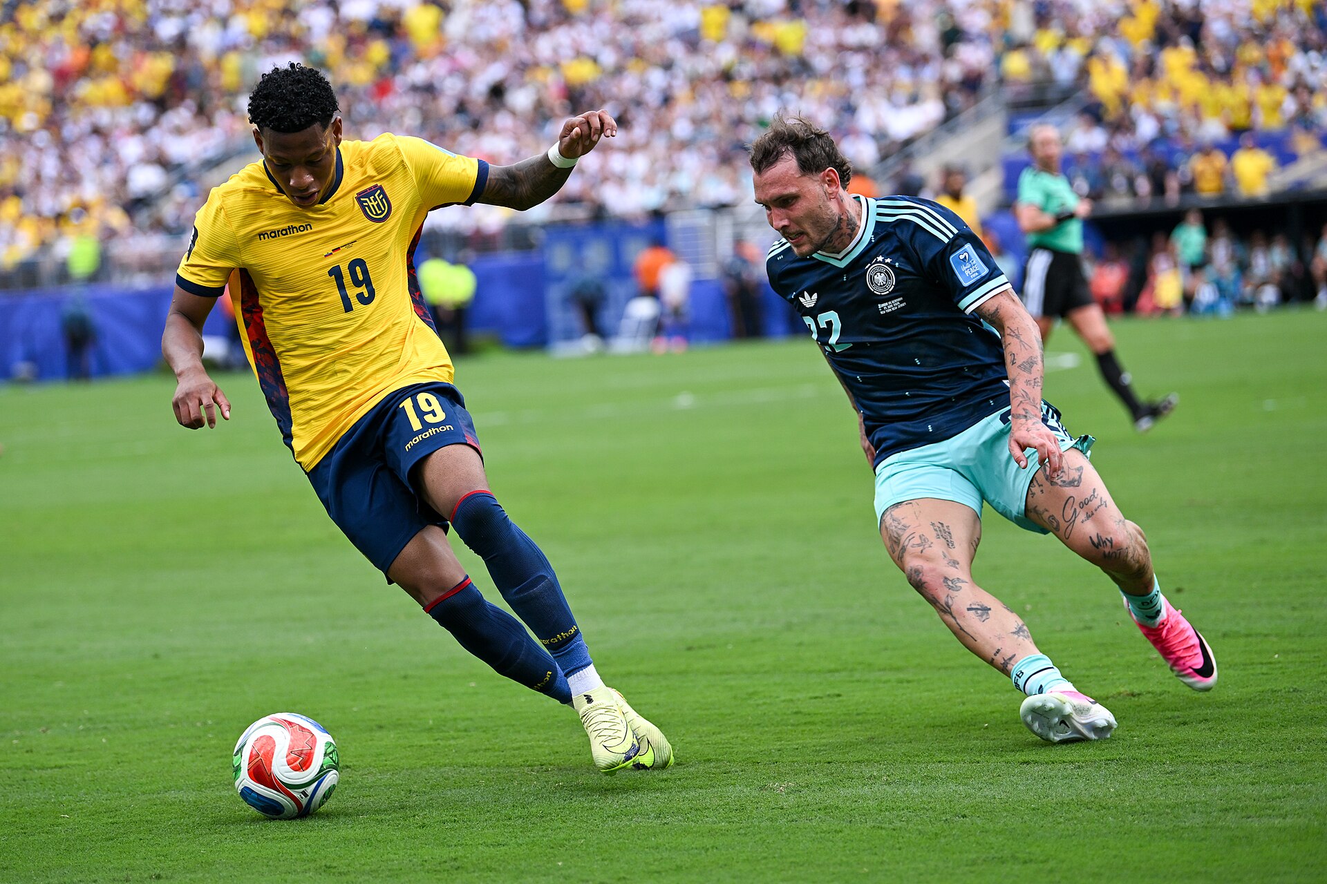 EAST RUTHERFORD, UNITED STATES - June 25: Gonzalo Plata #19 of Ecuador battles for possession with David Raum #22 of Germany during the FIFA World Cup 2026 Group E match between Ecuador  and  Germany on June 25, 2026 MetLife Stadium, East Rutherford, New Jersey