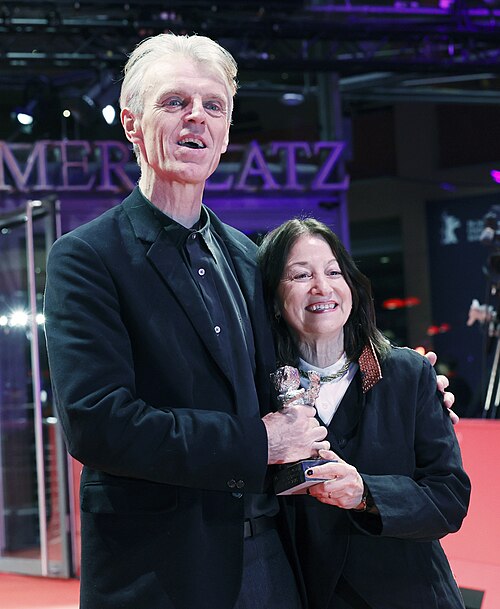 Grant Gee and Janine Marmot pose with the Silver Bear for Best Director for “Everybody Digs Bill Evans”on the red carpet after the Award Ceremony of Berlinale 2026 in Berlin, Germany