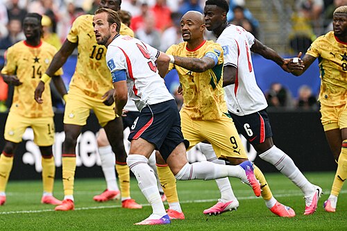 FOXBOROUGH, UNITED STATES - June 23: Harry Kane #9 of England is in action against Jordan Ayew #9 of Ghana during the FIFA World Cup 2026 Group L match between England and Ghana on June 23, 2026 Boston Stadium , Foxborough, Massachusetts