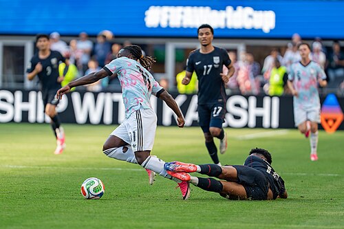 Jeremy Doku Alex Freeman during Belgium v United States at the 2026 FIFA World Cup