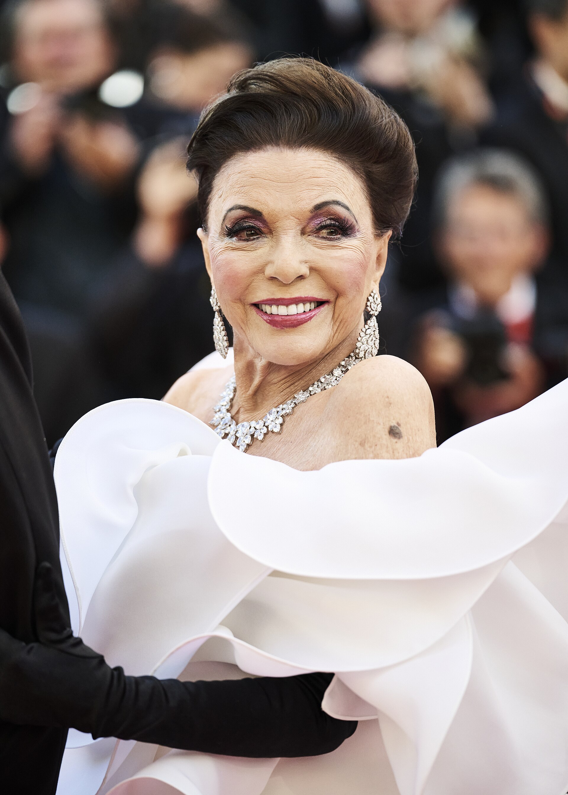Joan Collins walks the opening red carpet at the 2026 Cannes Film Festival