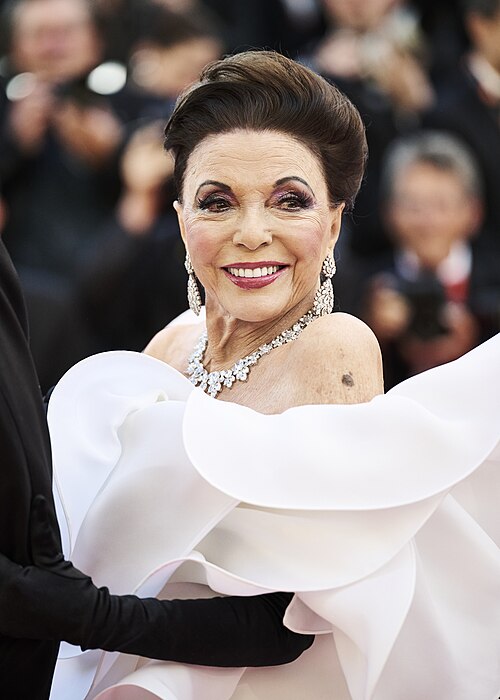 Joan Collins walks the opening red carpet at the 2026 Cannes Film Festival