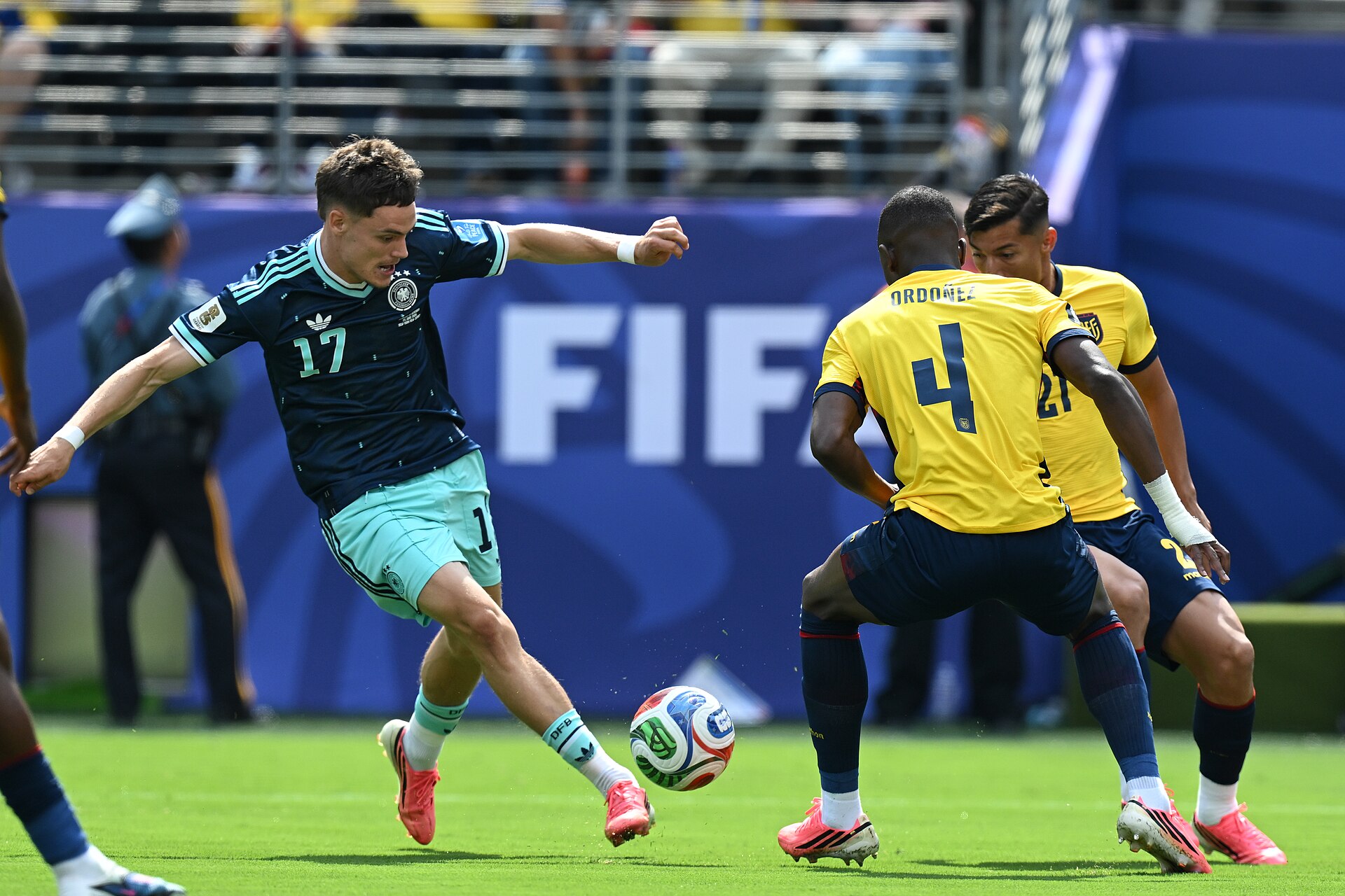 EAST RUTHERFORD, UNITED STATES - June 25: Joel Ordonez #4, Alan Franco #21 of Ecuador is in action against Florian Wirtz #17 of Germany (C) during the FIFA World Cup 2026 Group E match between Ecuador  and  Germany on June 25, 2026 MetLife Stadium, East Rutherford, New Jersey