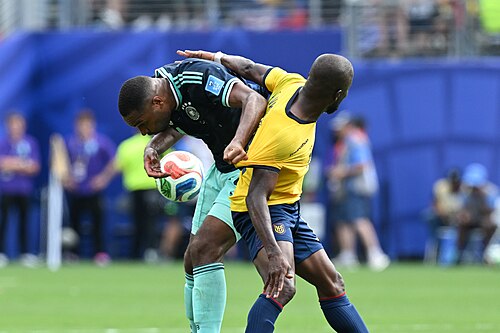 EAST RUTHERFORD, UNITED STATES - June 25: Jonathan Tah #4 of Germany battles for possession with Enner Valencia #13 of Ecuador during the FIFA World Cup 2026 Group E match between Ecuador  and  Germany on June 25, 2026 MetLife Stadium, East Rutherford, New Jersey