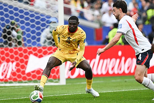 FOXBOROUGH, UNITED STATES - June 23: Jordan Ayew #9 of Ghana is in action against Declan Rice #4 of Englandduring the FIFA World Cup 2026 Group L match between England and Ghana on June 23, 2026 Boston Stadium , Foxborough, Massachusetts
