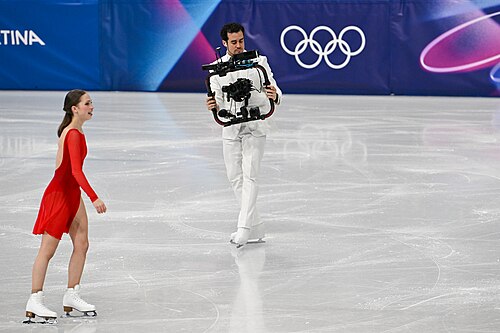 MILAN, ITALY - FEBRUARY 19: Camera man Jordan Cowan is live  during the Women's Single Skating on day thirteen of the Milano Cortina 2026 Winter Olympic games at Milano Ice Skating Arena on February 19, 2026 in Milan, Italy.