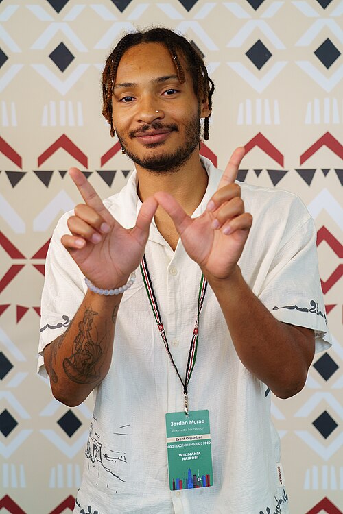 Jordan McRae portrait at Wikimania 2025 WikiPortraits Studio
